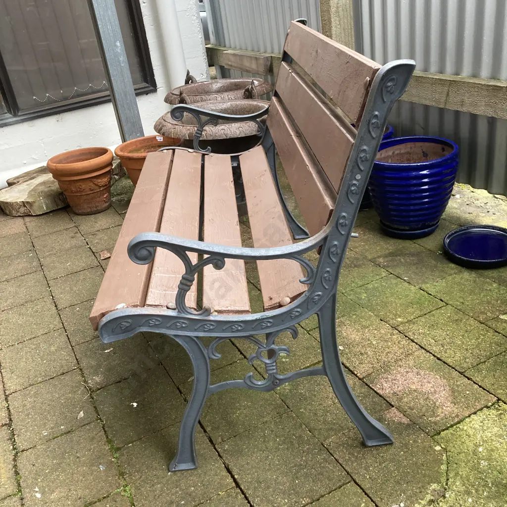 Wooden Slat Park Bench With Cast Iron Ends. 72 x 107cm Image 1++